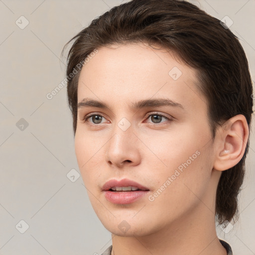 Neutral white young-adult female with medium  brown hair and brown eyes