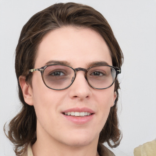 Joyful white young-adult female with medium  brown hair and blue eyes