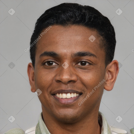 Joyful latino young-adult male with short  black hair and brown eyes