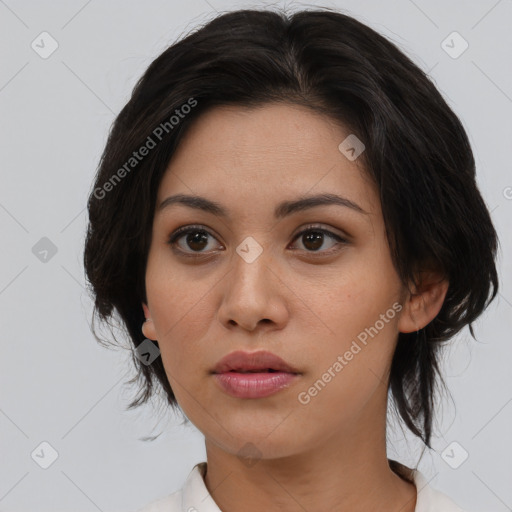 Neutral asian young-adult female with medium  brown hair and brown eyes