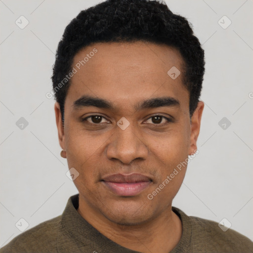 Joyful black young-adult male with short  black hair and brown eyes