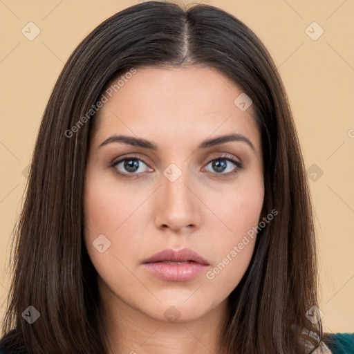 Neutral white young-adult female with long  brown hair and brown eyes