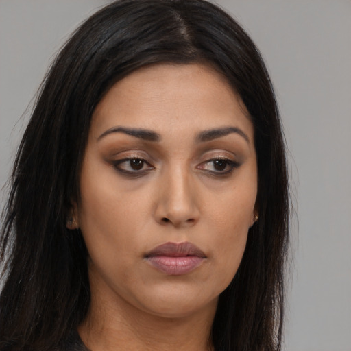 Neutral asian young-adult female with long  brown hair and brown eyes