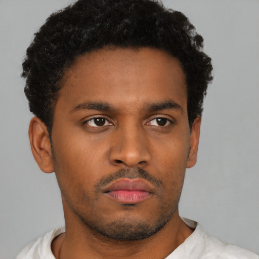 Neutral latino young-adult male with short  brown hair and brown eyes