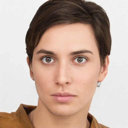 Neutral white young-adult female with short  brown hair and brown eyes