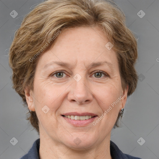 Joyful white middle-aged female with medium  brown hair and grey eyes