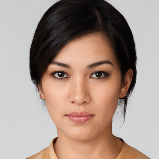 Neutral asian young-adult female with medium  black hair and brown eyes