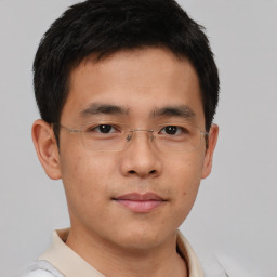 Neutral asian young-adult male with short  brown hair and brown eyes