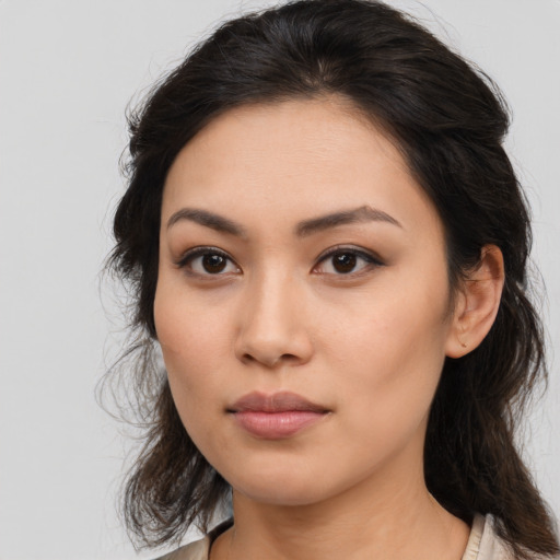 Neutral asian young-adult female with medium  brown hair and brown eyes
