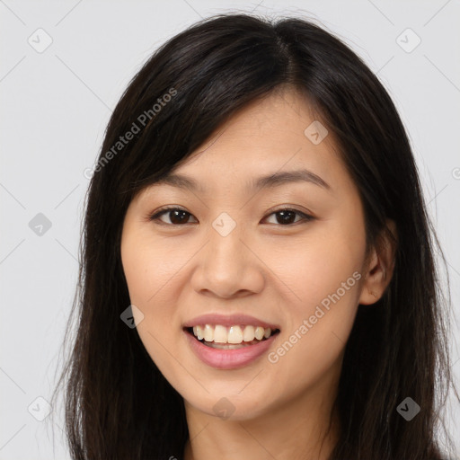 Joyful asian young-adult female with long  brown hair and brown eyes