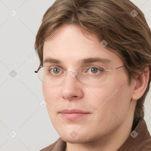 Joyful white adult male with medium  brown hair and grey eyes