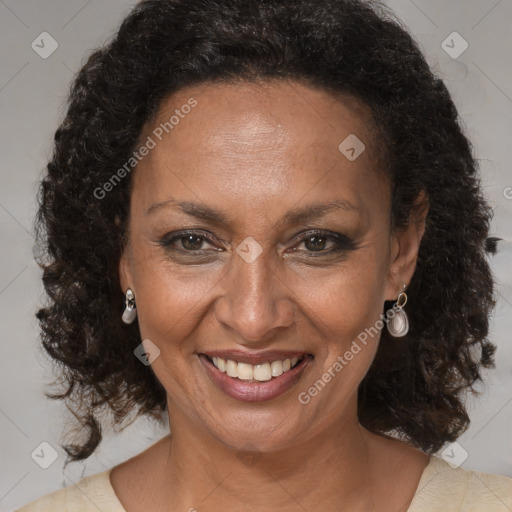 Joyful black adult female with medium  brown hair and brown eyes