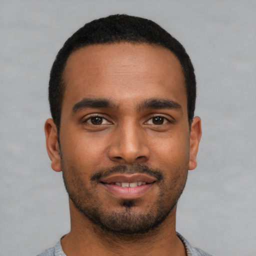 Neutral black young-adult male with short  black hair and brown eyes
