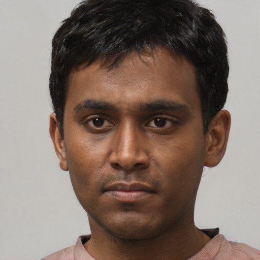Neutral white young-adult male with short  black hair and brown eyes