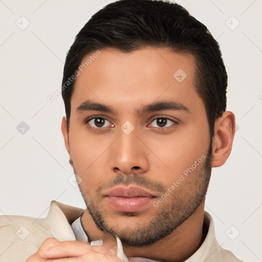 Neutral latino young-adult male with short  brown hair and brown eyes