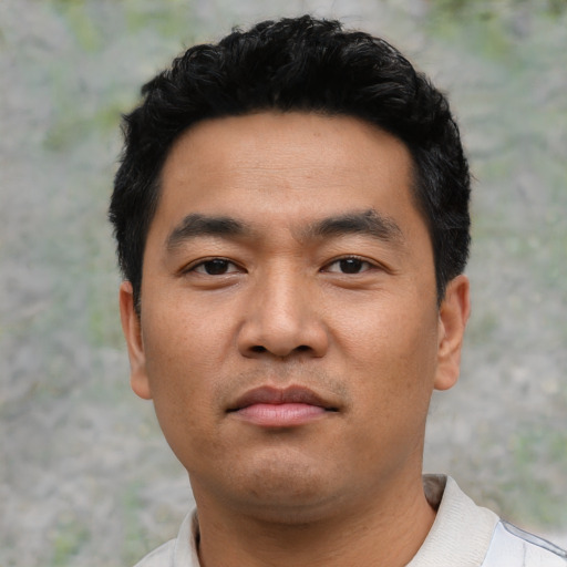 Neutral asian young-adult male with short  black hair and brown eyes