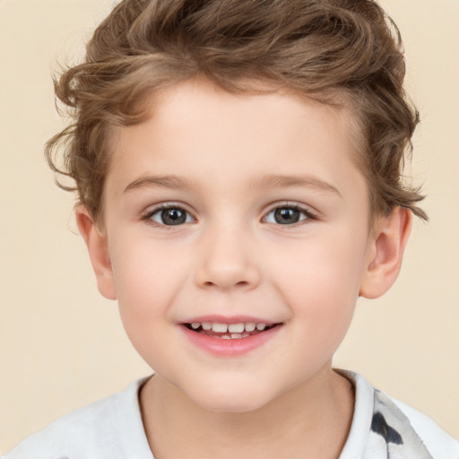 Joyful white child male with short  brown hair and brown eyes