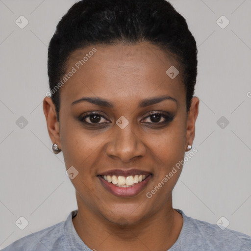 Joyful black young-adult female with short  black hair and brown eyes