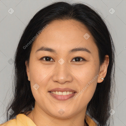 Joyful asian young-adult female with medium  brown hair and brown eyes