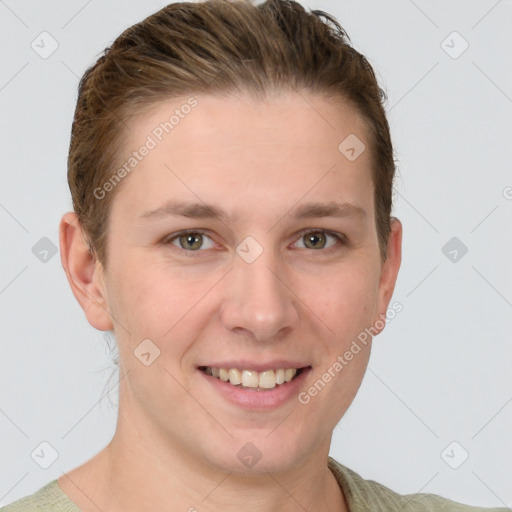 Joyful white young-adult female with short  brown hair and grey eyes