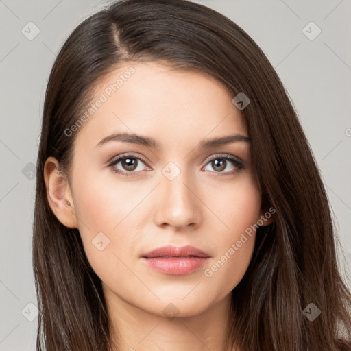 Neutral white young-adult female with long  brown hair and brown eyes