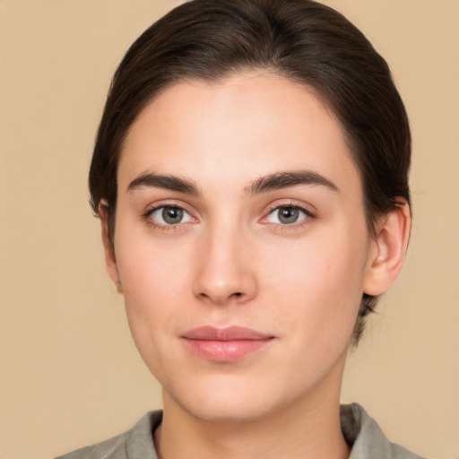 Neutral white young-adult female with medium  brown hair and brown eyes