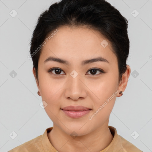 Joyful asian young-adult female with short  brown hair and brown eyes