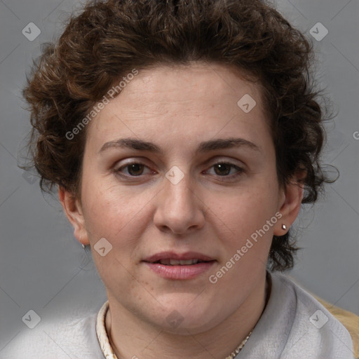 Joyful white adult female with short  brown hair and brown eyes