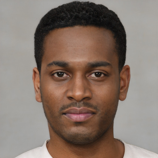 Neutral black young-adult male with short  black hair and brown eyes