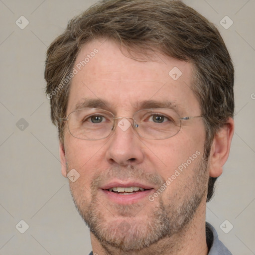 Joyful white adult male with short  brown hair and grey eyes