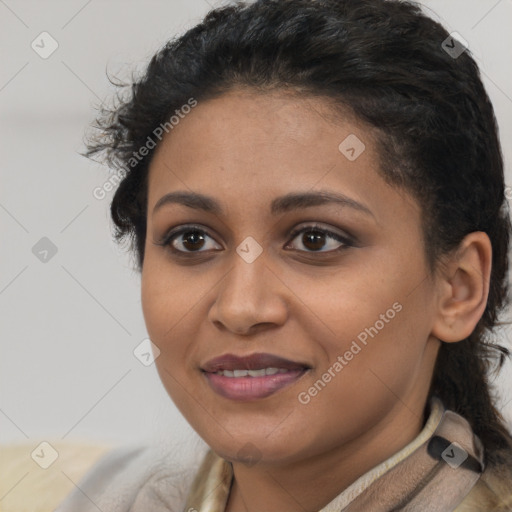 Joyful latino young-adult female with short  brown hair and brown eyes