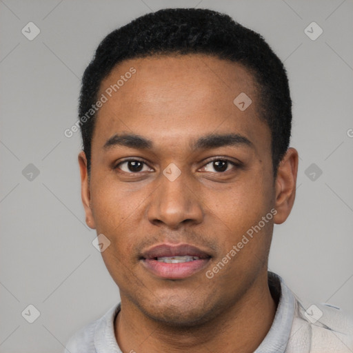 Joyful black young-adult male with short  black hair and brown eyes