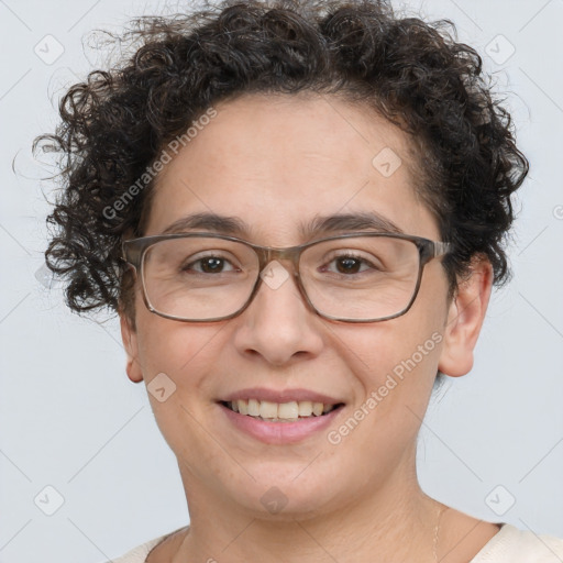 Joyful white adult female with short  brown hair and brown eyes