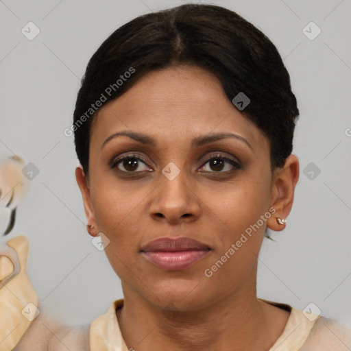 Joyful black young-adult female with short  brown hair and brown eyes