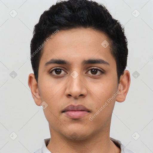 Neutral latino young-adult male with short  black hair and brown eyes