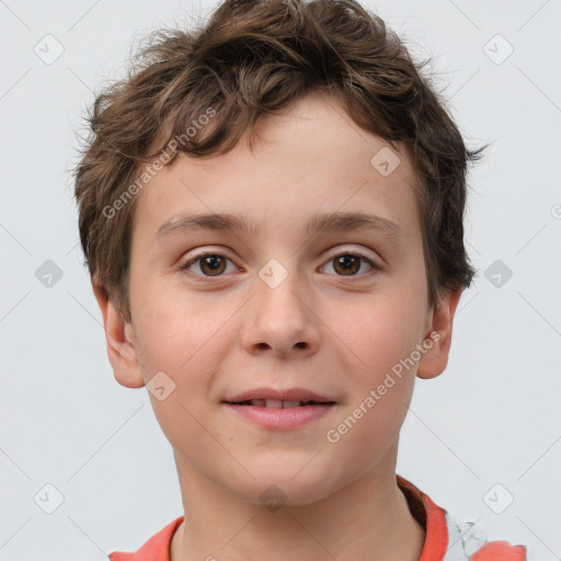 Joyful white child male with short  brown hair and grey eyes