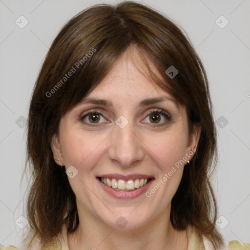 Joyful white young-adult female with medium  brown hair and green eyes