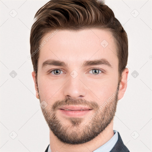 Joyful white young-adult male with short  brown hair and grey eyes