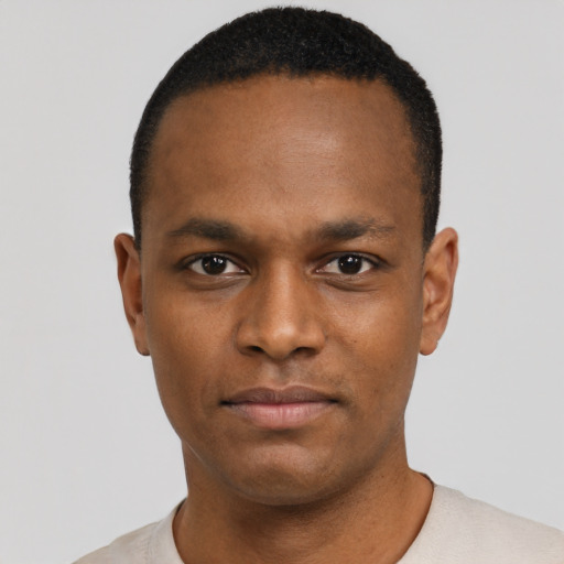 Neutral black young-adult male with short  black hair and brown eyes