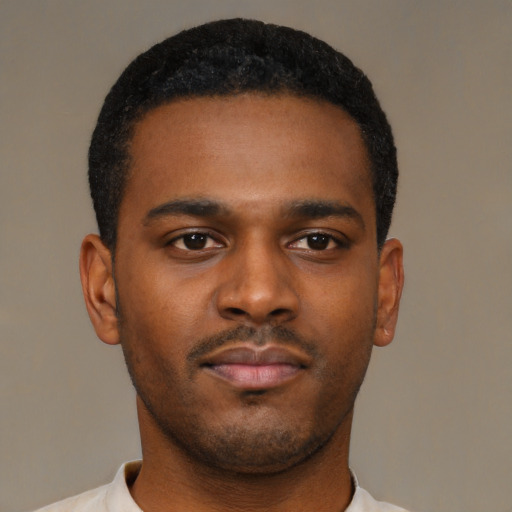 Neutral latino young-adult male with short  brown hair and brown eyes