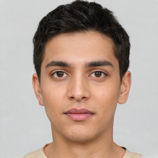 Neutral white young-adult male with short  black hair and brown eyes