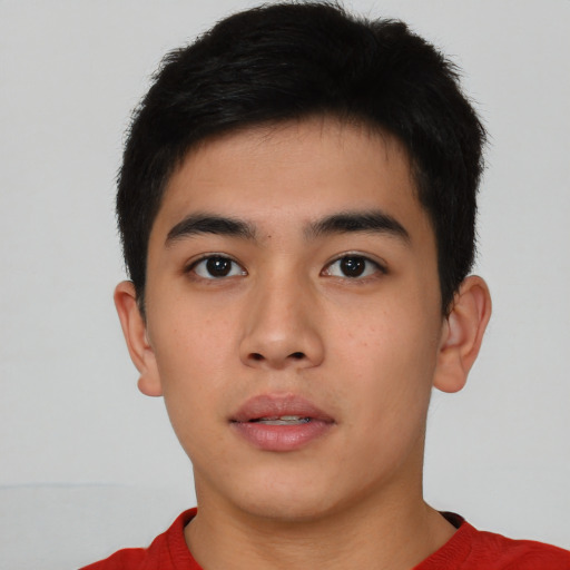 Neutral asian young-adult male with short  brown hair and brown eyes