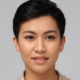 Joyful asian young-adult female with short  black hair and brown eyes