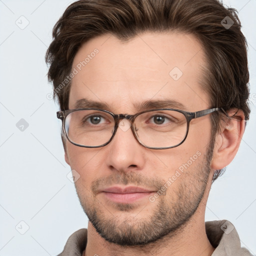 Neutral white adult male with short  brown hair and brown eyes