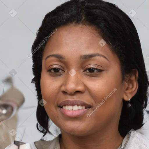 Joyful black young-adult female with medium  brown hair and brown eyes