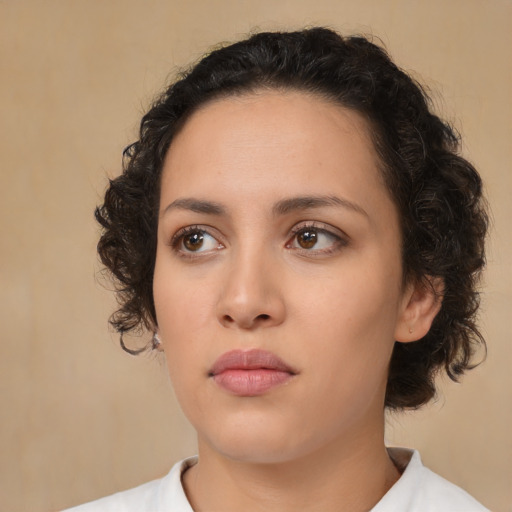 Neutral latino young-adult female with medium  brown hair and brown eyes