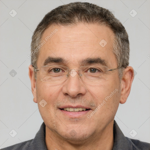 Joyful white middle-aged male with short  brown hair and brown eyes