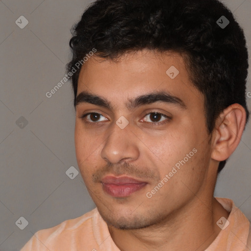 Neutral white young-adult male with short  black hair and brown eyes