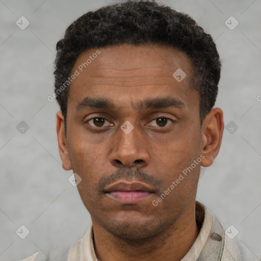 Neutral latino young-adult male with short  black hair and brown eyes