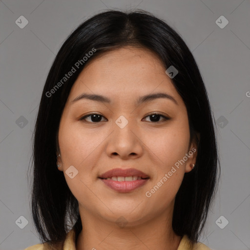 Joyful asian young-adult female with medium  brown hair and brown eyes